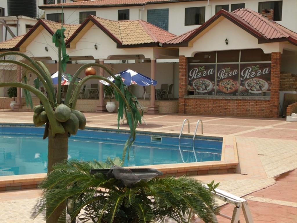 True Vine Hotel Кумаси Экстерьер фото